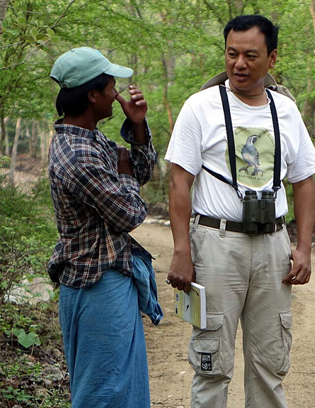 Aung Myo Chit in discussion with a villager in Tawyagyi Wildlife Sanctuary